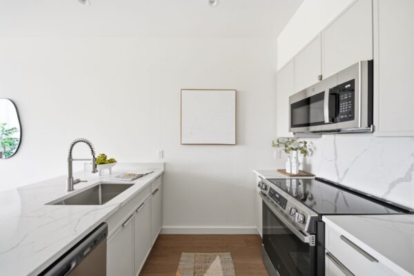 1 bedroom kitchen with stainless steel appliances