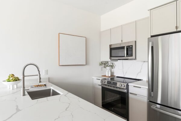1 bedroom kitchen with stainless steel appliances